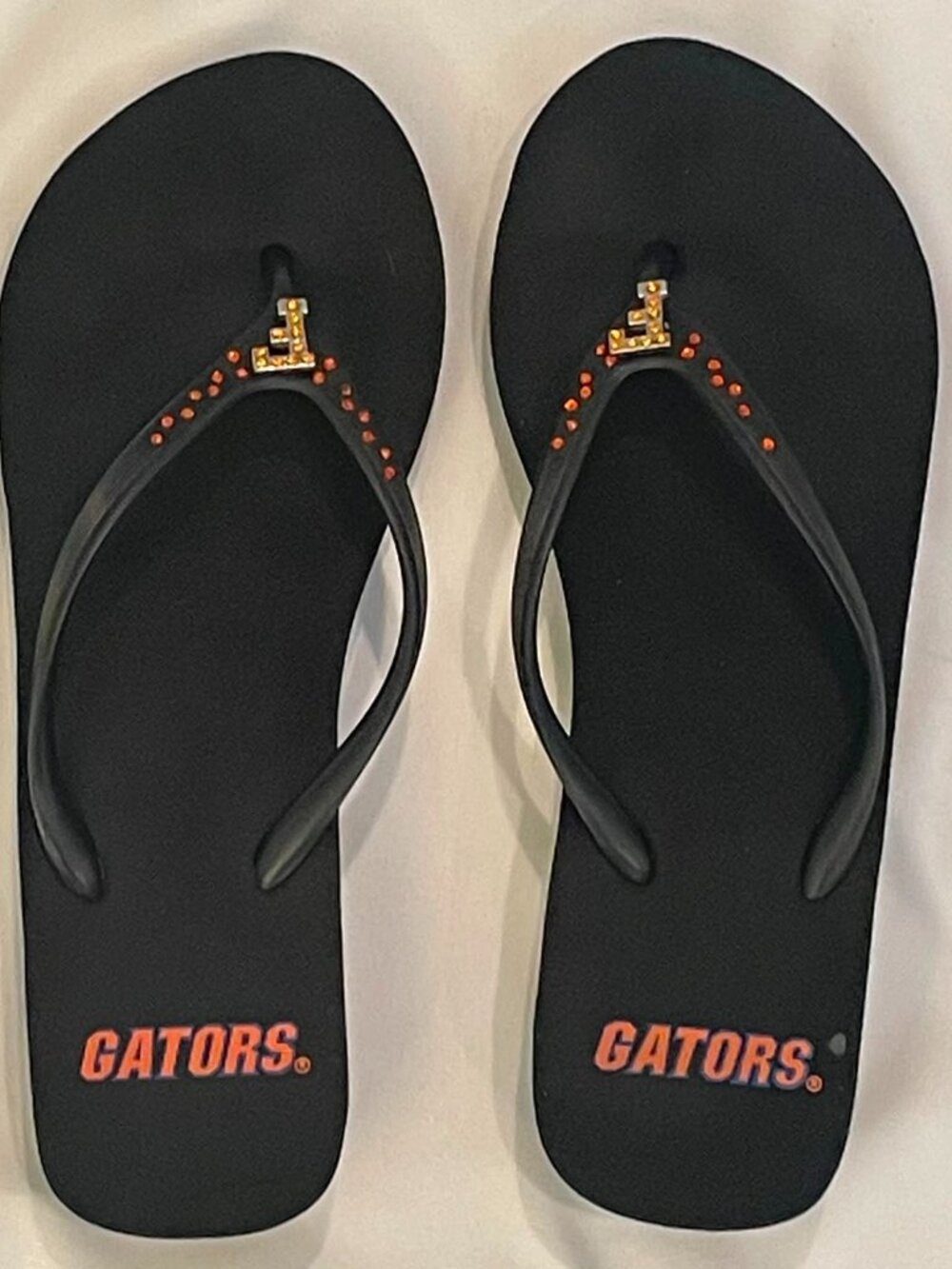 FLORIDA GATOR Women’s Black Flip Flops, Unknown Size (fits similar to 7.5)